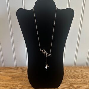 Elegant Gold Tone Leaf Necklace with White Pendant
